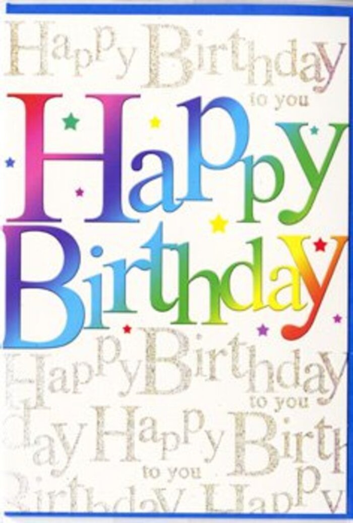 The photograph shows a beautifully designed birthday card, propped upright and radiating the same vibrant cheer you might find in a fresh arrangement on display at Flower Delivery Mitcham. The card's central focus is the 'Happy Birthday' message, written in generous, rounded letters that feel both modern and friendly. Each letter is filled with a smooth spectrum of colour, gliding from deep berry and warm coral into bright sunflower yellow, then transitioning into lively green, clear turquoise, and intense blue, finishing with subtle violet notes. This rainbow effect is blended with care, creating a sense of depth and softness, as though the letters were softly lit from within. Behind this exuberant greeting, the background is entirely overlaid with fine, delicate script in metallic gold, repeating 'Happy Birthday to you' in flowing, cursive lines. The script loops and curves across the card like streams of handwriting in a keepsake journal, and the gold ink adds a refined shimmer, akin to late-afternoon light catching the rooftops around Mitcham and Cricket Green. Under gentle lighting, the metallic detail glistens without overpowering the main text. Small, playful speckles and dots, tinted in complementary rainbow hues, are sprinkled lightly around the greeting, suggesting floating confetti or distant stars. The card's finish appears satin-smooth, with just enough gloss to enhance the colours and give the gold script a delicate glow. Altogether, the design combines festive colour, elegant texture, and a sense of heartfelt joy, making it the perfect birthday card to accompany a florist's bouquet heading out for delivery across Mitcham, from quiet residential streets to the lively shops along London Road.